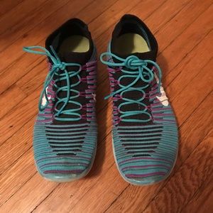 Blue and purple Nike fly knit shoes